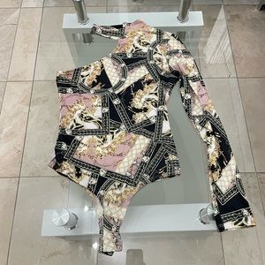 Black, yellow and pink bodysuit. Stretchy.